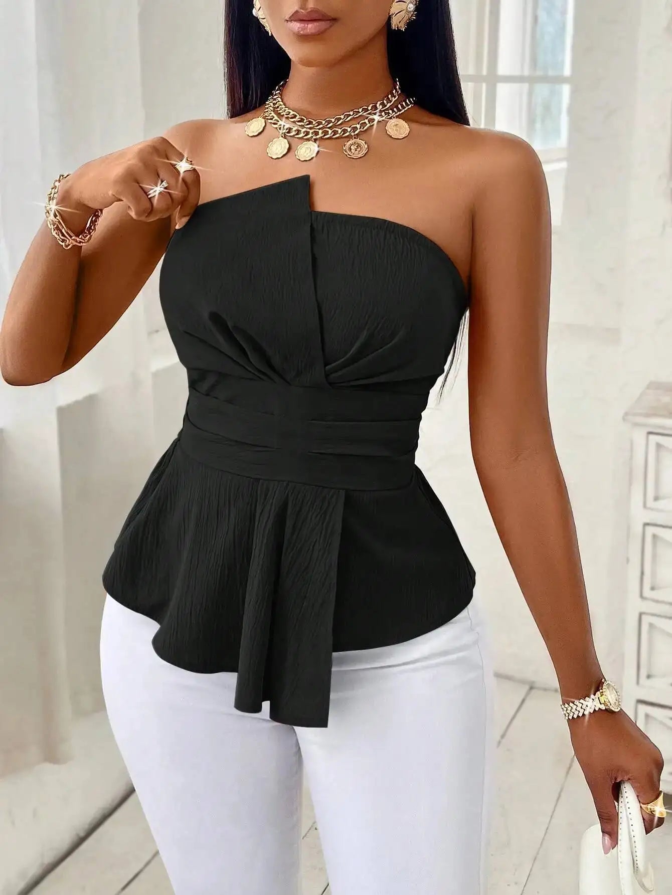 ISABELLA | TOP BUSTIER CON BALZA SCULTUREA