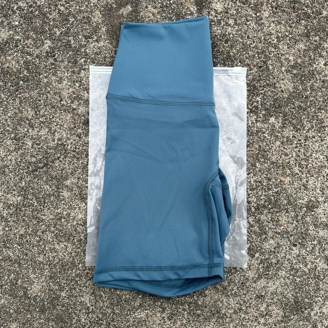 KATIA | Pantalones Cortos de Entrenamiento de Cintura Alta con Bolsillos
