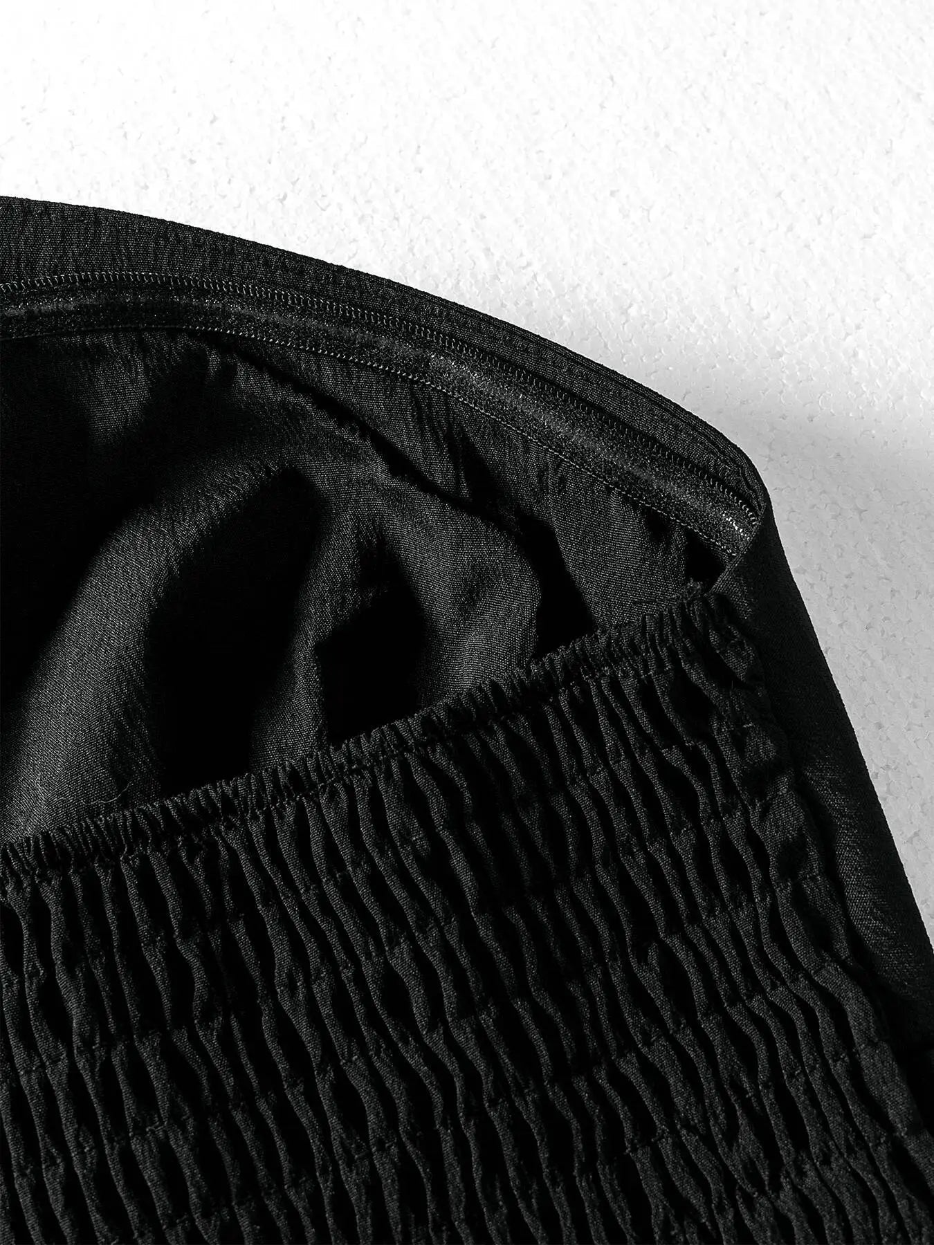 ISABELLA | TOP BUSTIER CON BALZA SCULTUREA