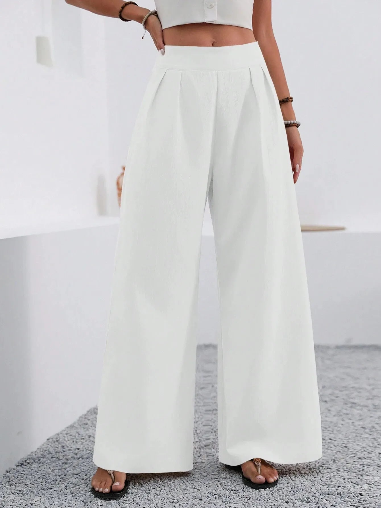 GIULIA | PANTALONE PALAZZO DALLE LINEE FLUIDE