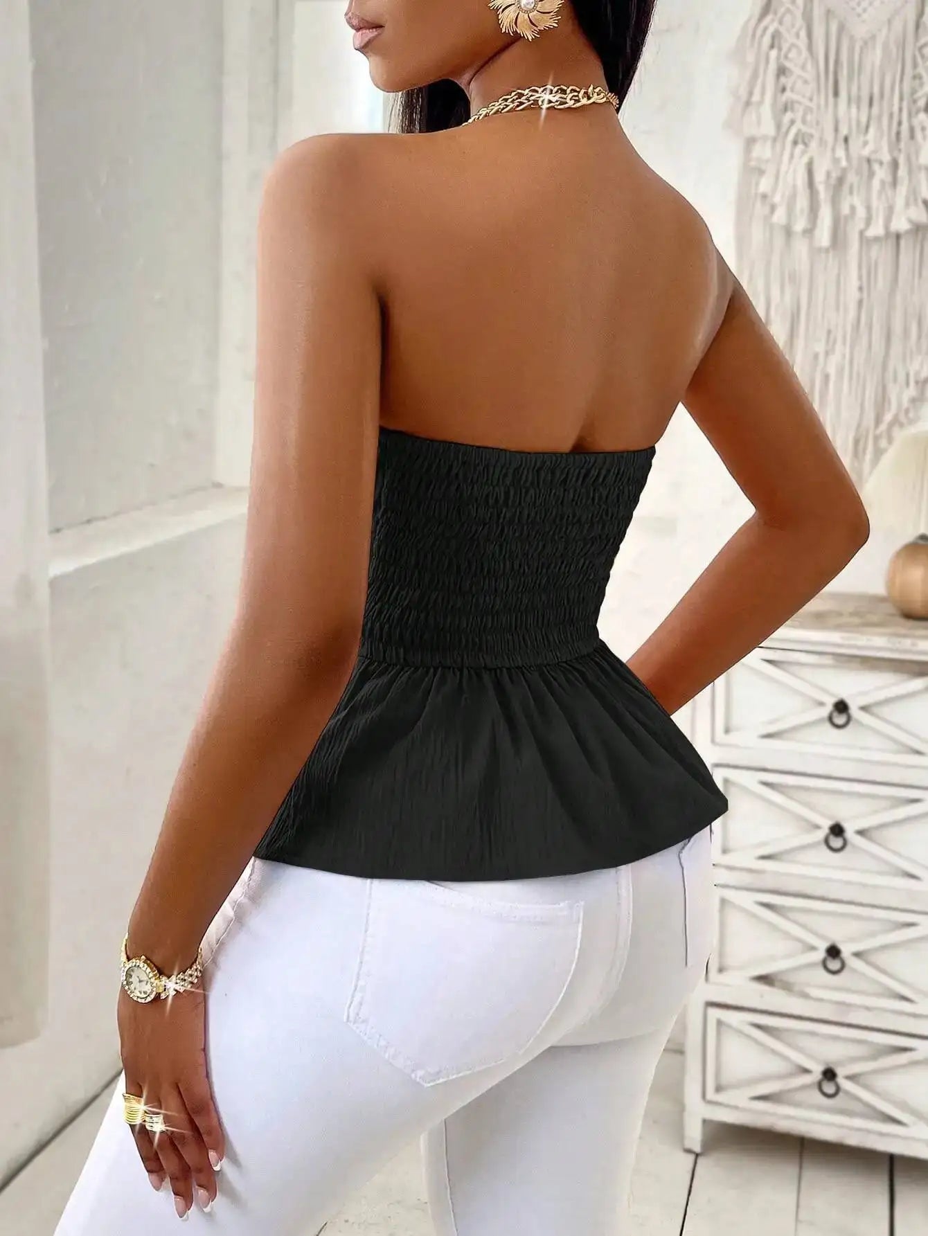 ISABELLA | TOP BUSTIER CON BALZA SCULTUREA